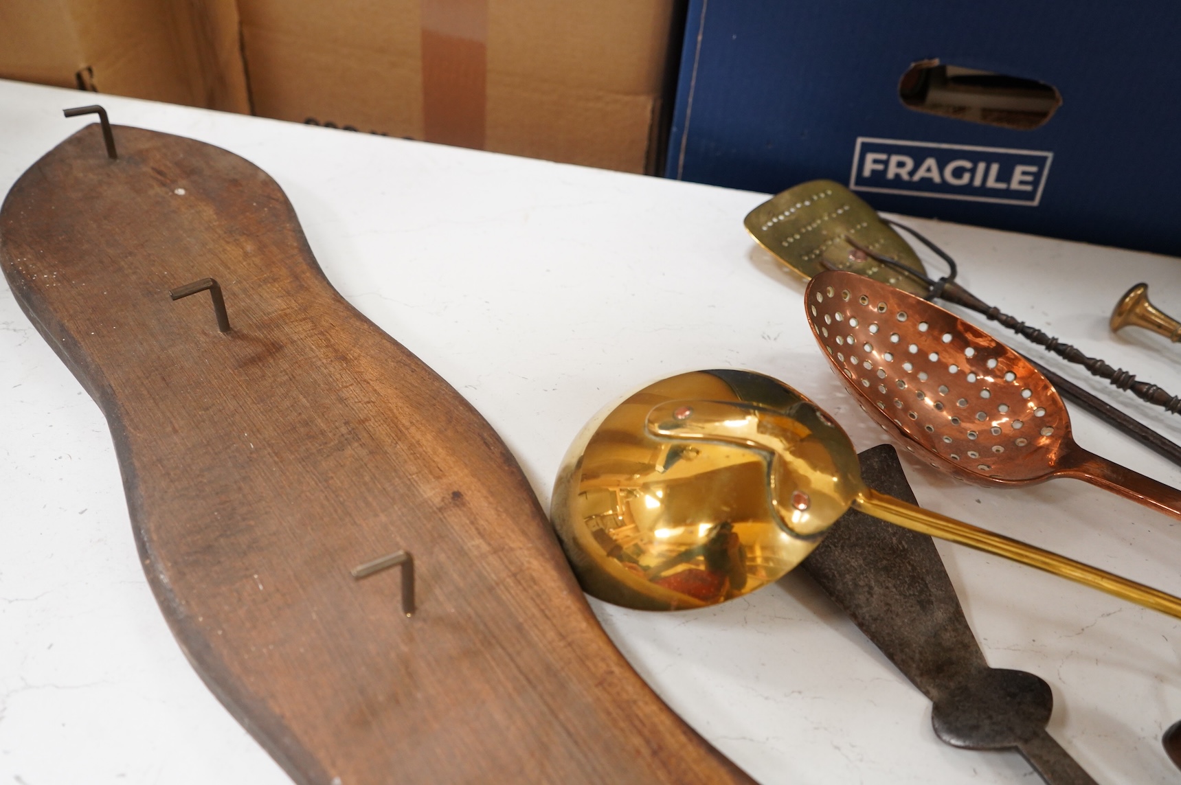 A 19th century toasting fork - longest 59cms, strainer spoons, etc